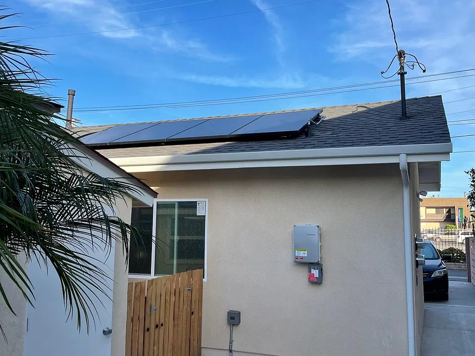 Private gated patio and entrance solar panels on roof