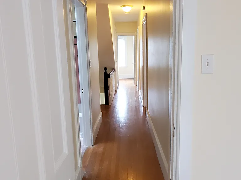 Long view of second floor hallway