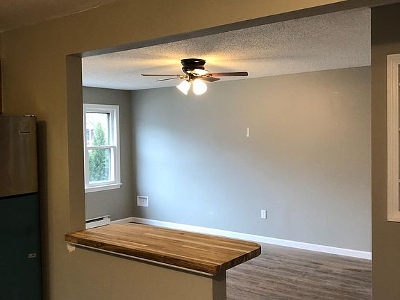 Kitchen looking into living room