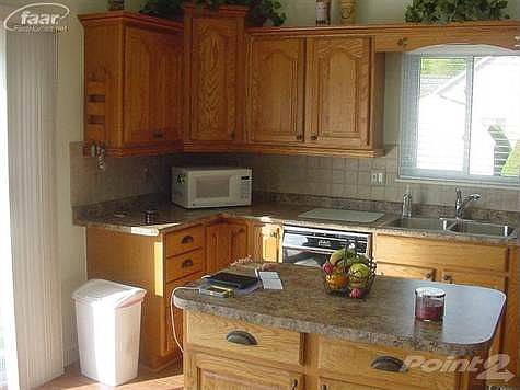 Beautiful cabinets with open area above for decorative touches