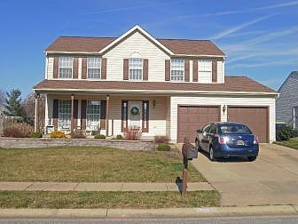 Colonial on landscaped lot w/in ground sprinkler