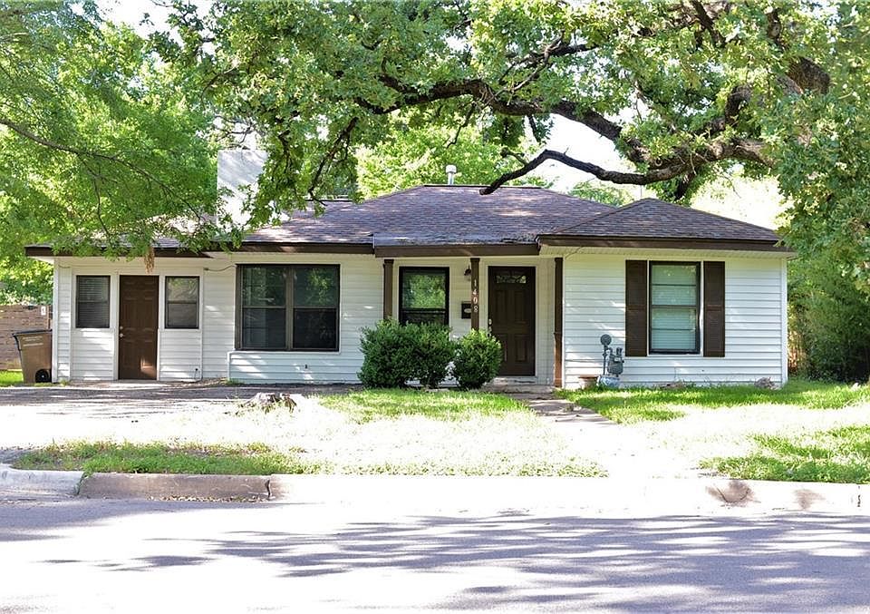 Front of the house with shaded trees