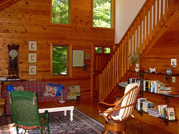 LIving area with vaulted ceiling
