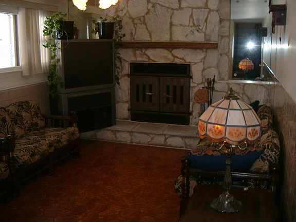 Family room with wood-buring fireplace