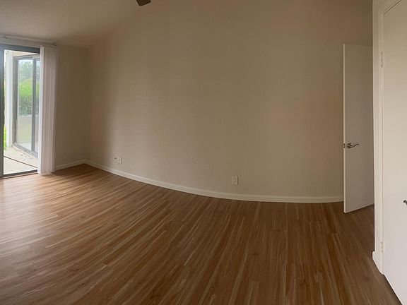 Bedroom or office with slider to back patio