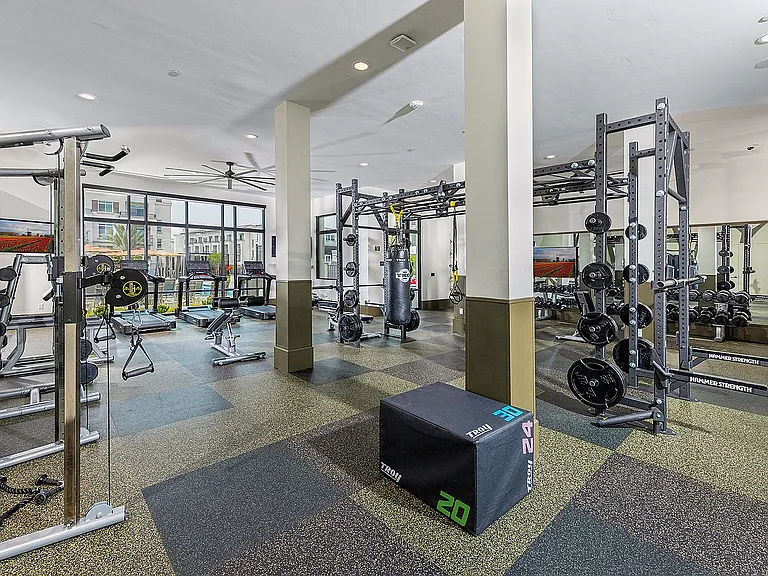 Two level fitness with weightlifting, TRX, Peloton Bike and Peloton Rower, Stair Climber, and more.