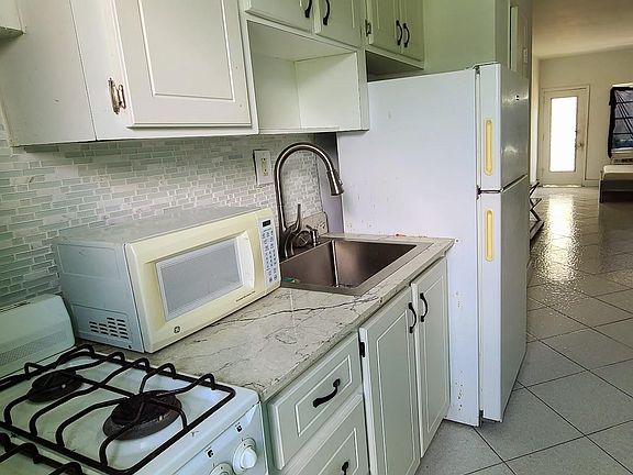 2nd image of 6490 Collins Ave #14E