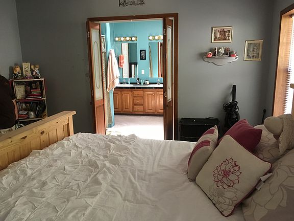 Master bedroom looking into bathroom