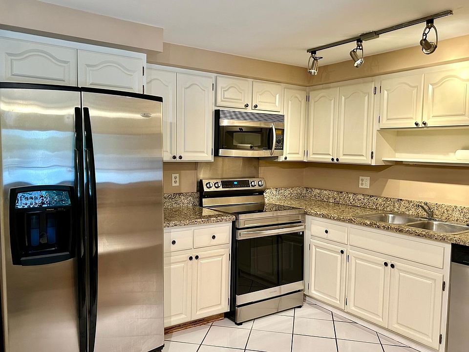 New Samsung range, newer garbage disposal, convection microwave oven, granite countertops.