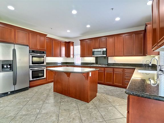 Kitchen with Granite and Stainless Appliances