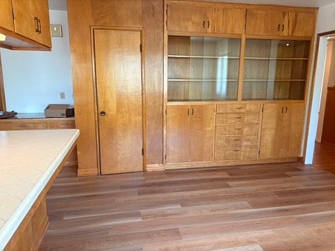 Wall of beautifully built-in storage and display in Dining room!