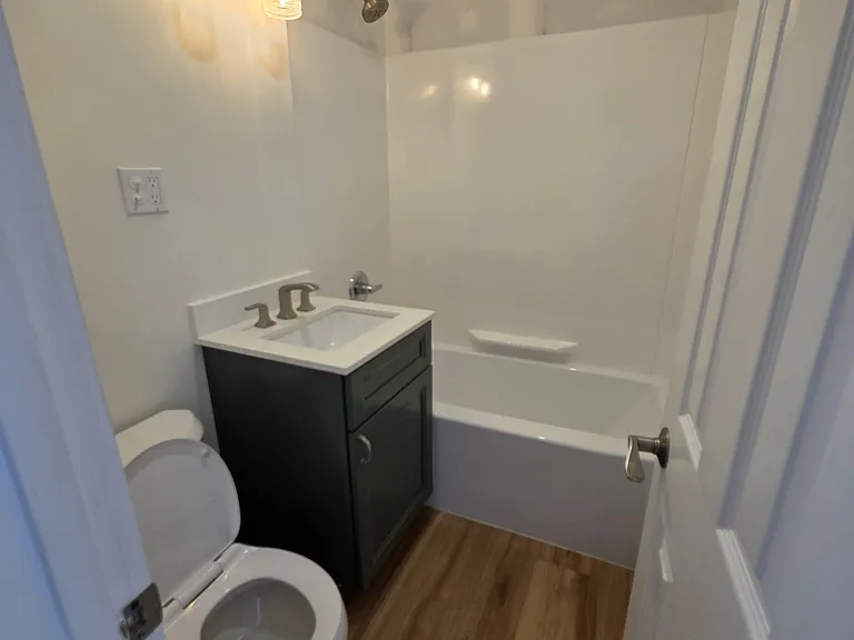Fully remodeled bathroom, vanity, granite counter, new toilet, tub/shower, exhaust fan, fresh paint