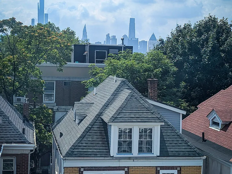 Midtown skyline views from guest bedroom - visible too from living room
