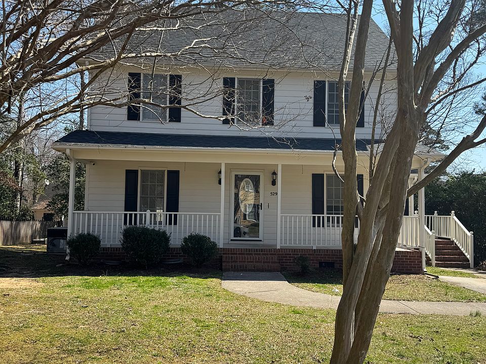 Front of the house with side entrance near washer/dryer room.