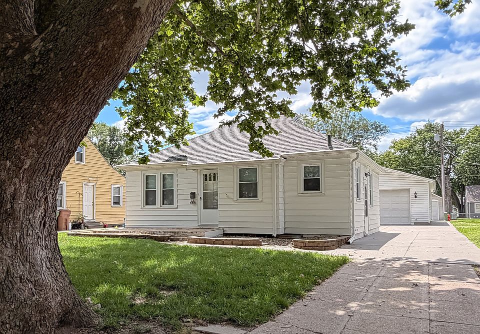 Exterior Front of Home with Detached Garage