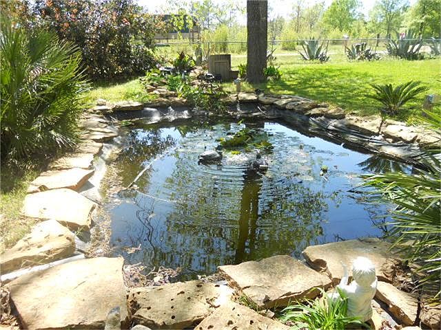 GOLD FISH POND LANDSCAPED IN STONE