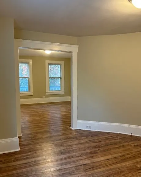 Looking from the dining room into the living room