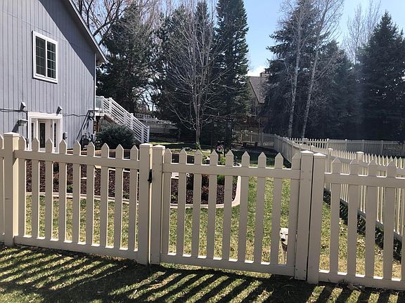 Fenced entrance to access basement unit.