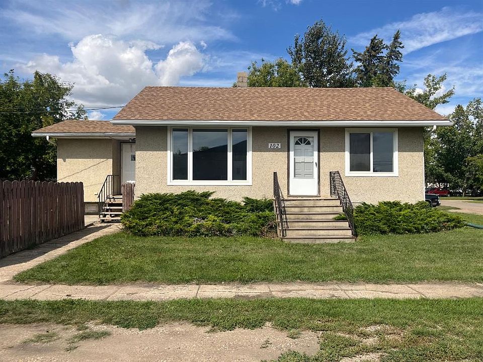 1st image of 102 S 3rd St E