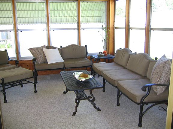 Wonderful three season porch with access to the backyard.