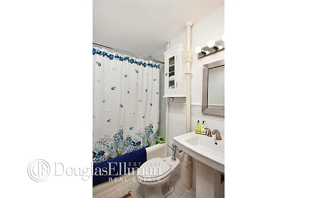 Sold by Douglas Elliman | media 13