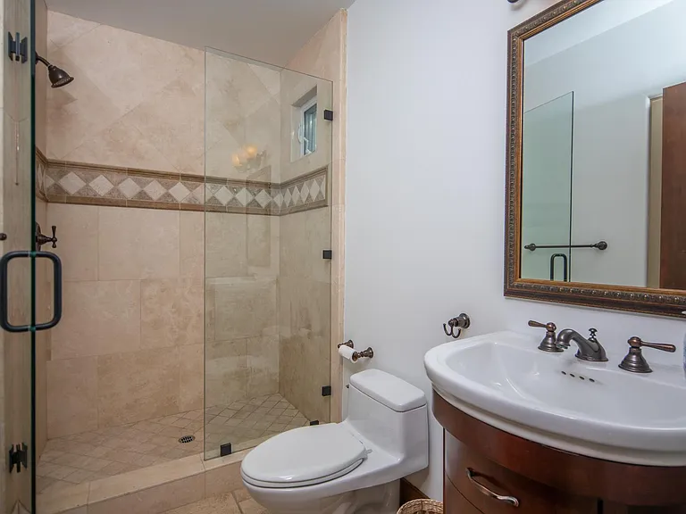 Full bath attached to bonus / pool room attached to garage