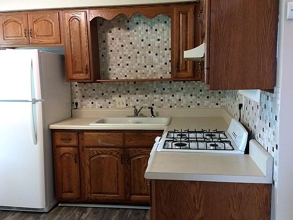 KItchen comes with stove & refrigerator.