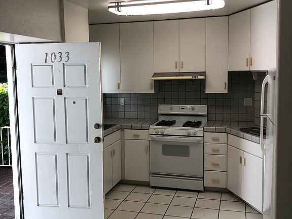 Kitchen opens to dining and living room