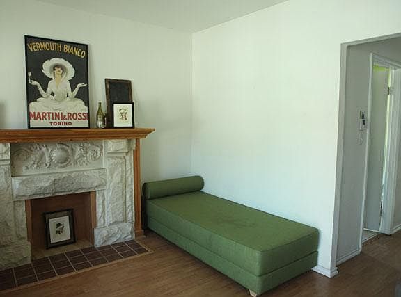Living room with ornate fireplace