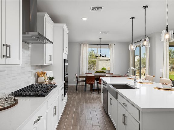 Welcome to the Bailey floorplan modeled at Paloma Creek in Surprise, AZ.