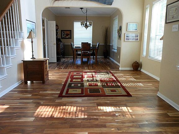 Upon entering, you will see the living room, formal dining room combo with new hardwood floors!