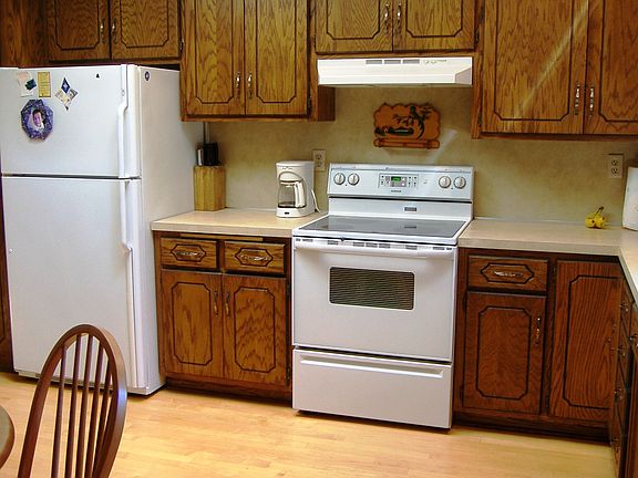You will have plenty of room in this large 15x12 kitchen with hard wood floors