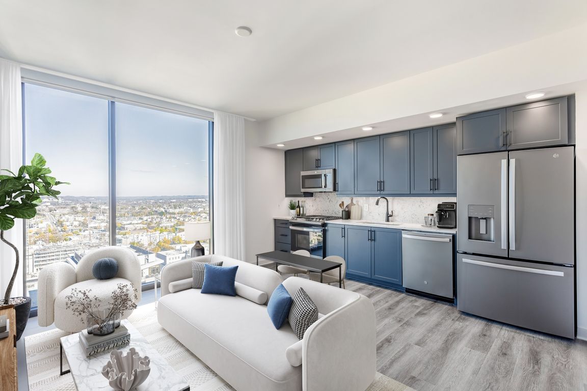Studio with Floor to Ceiling Windows with a View of the City.