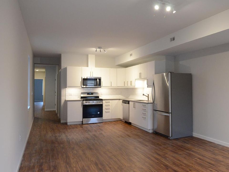 View from living space to kitchen. (bedrooms and baths down the hall)