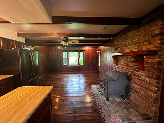 Family room and kitchen with wood burning stove