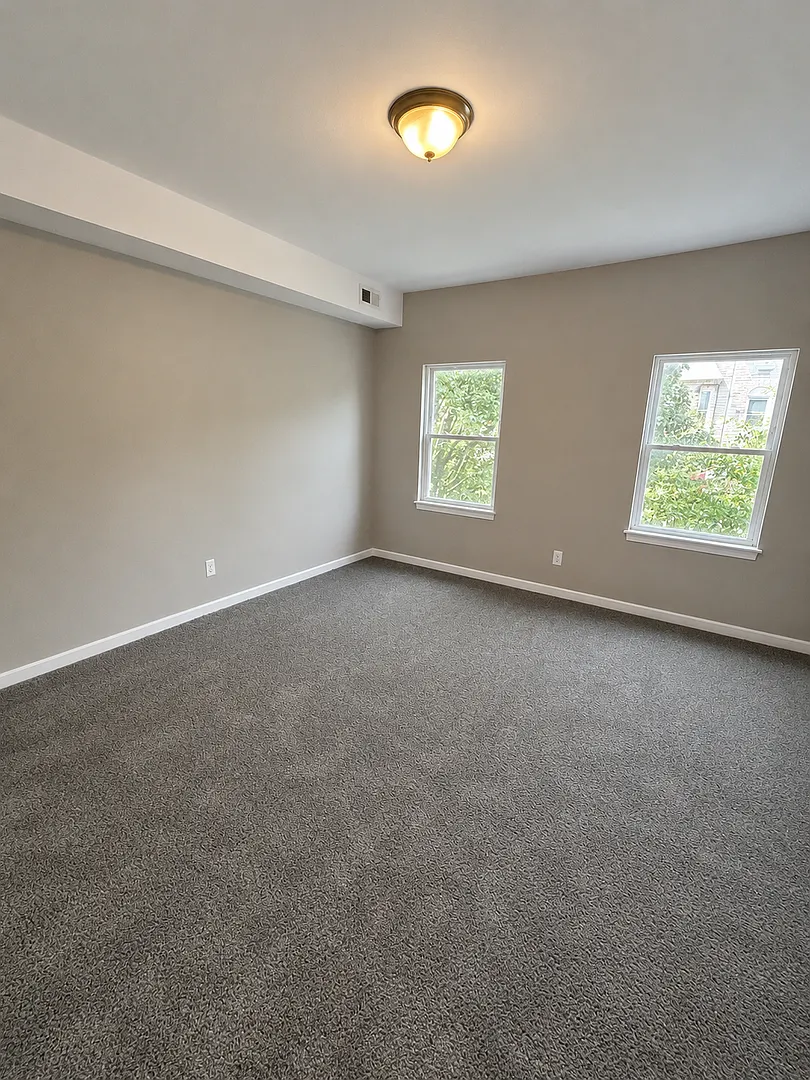 Charming Baltimore Rowhome with Private Deck & Exposed Brick — Photo 2