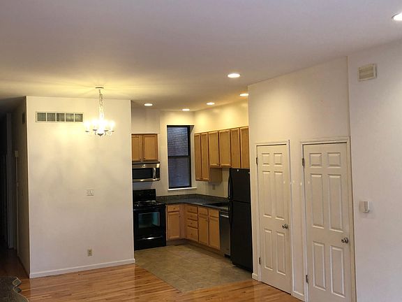 Kitchen includes: stove, microwave, dishwasher, disposal and refrigerator (with ice maker)