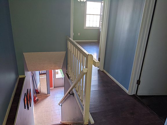 Staircase looking into master bedroom.