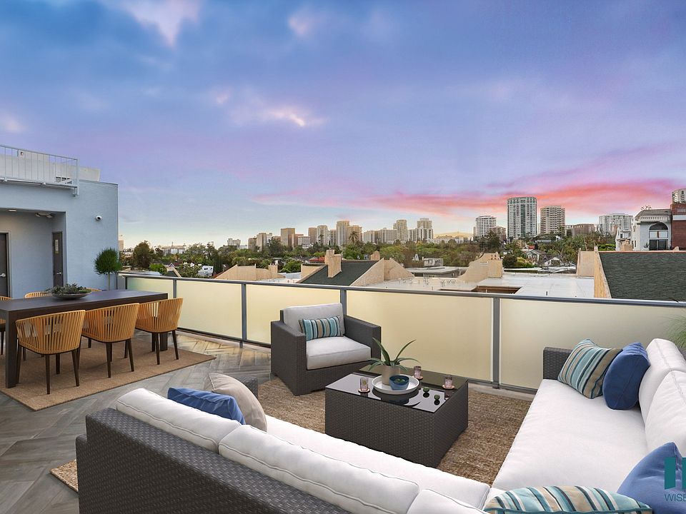 Rooftop Terrace with Entertainment and Seating Area