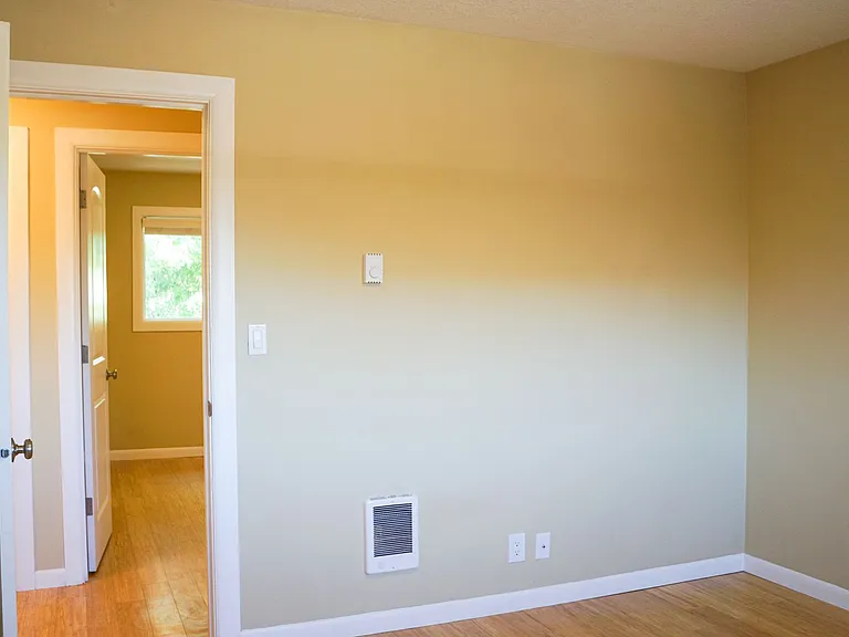 Top-Floor 2-Bedroom with Bamboo Flooring + Off-Street Parking! — Photo 8
