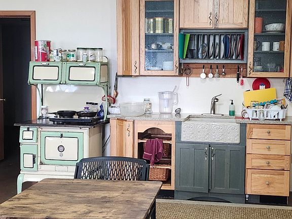 Kitchen- Wood cook stove is not installed, just used for storage and counter space.