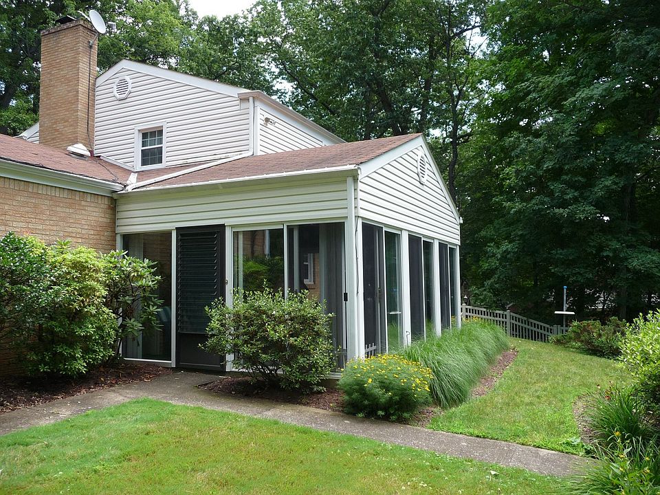 exterior of 3 season room which faces pool