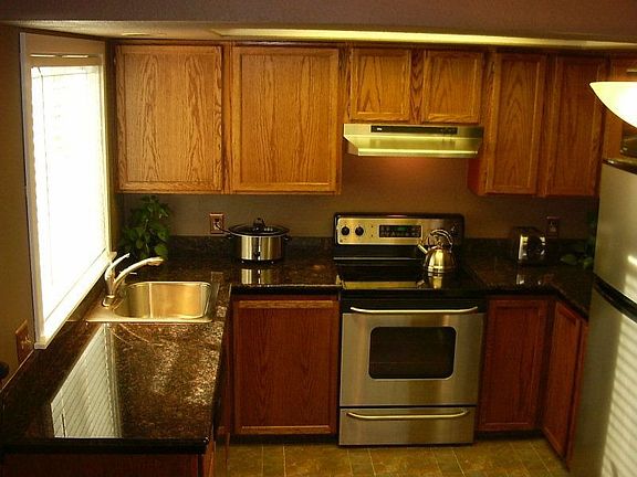 Stainless Steel Appliances, New Granite,Floor,Lighting, Refaced Cabinets