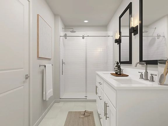 Primary bath with glass shower enclosure