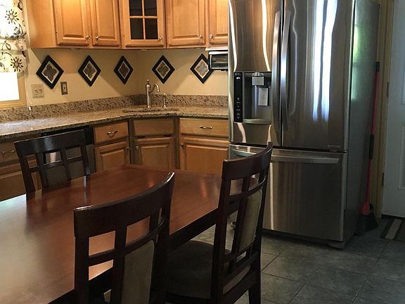 Kitchen with granite counters and stainless steel appliances