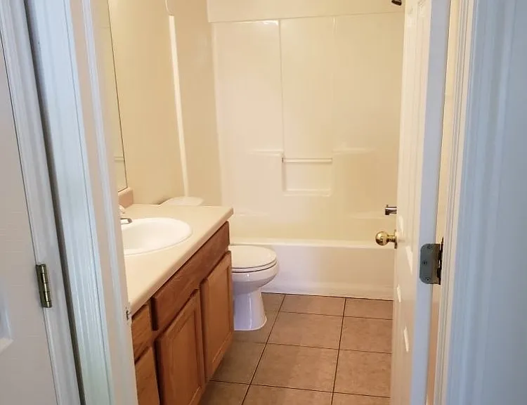 Full bath upstairs with linen closet.