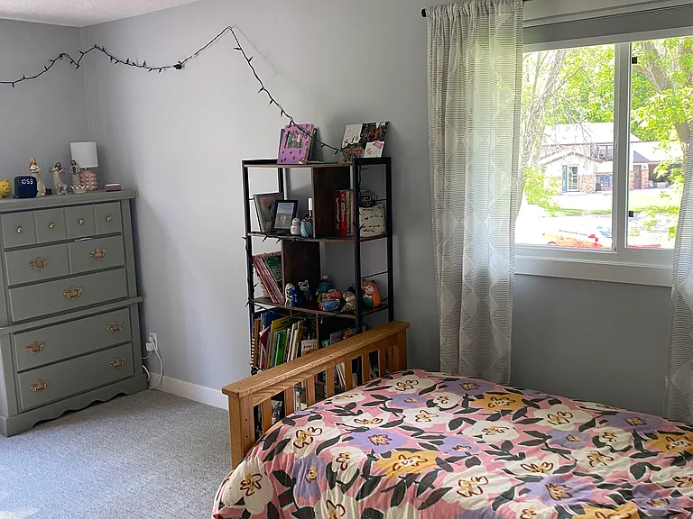 Upstairs front right bedroom. Across from Primary
