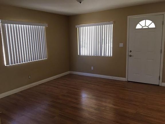 Large Open Livingroom with Plenty of natural lighting.