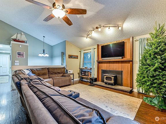Wood burning fireplace and room for a huge sectional>
