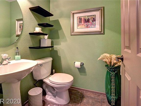 1/2 bathroom as you walk up stairs